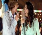 Gabriella Montez (Vanessa Hudgens), Troy Bolton (Zac Efron) singing karaoke